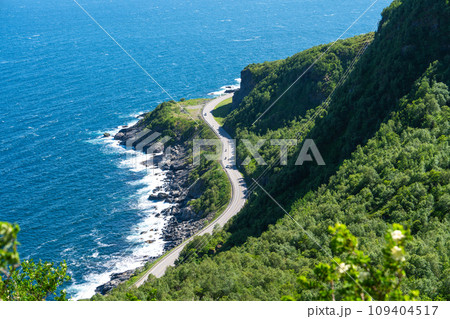 Summer sunny day at Lofoten, Norway, Nordland. Landscape with dramatic mountains and sea, ocean. Summer sunny day at Lofoten, Norway, Nordland. Landscape with dramatic mountains and sea, ocean. 109404517