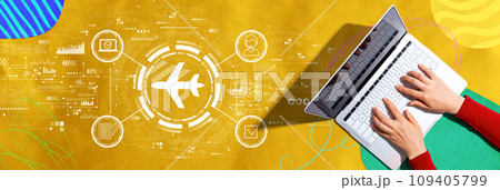 Flight ticket booking concept with person using a laptop Flight ticket booking concept with person using a laptop 109405799
