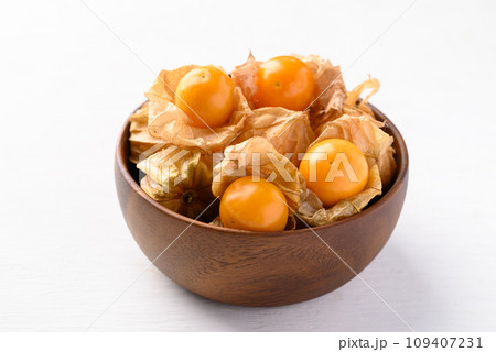 Cape gooseberry, Goldenberry or Physalis peruviana in bowl on white background Cape gooseberry, Goldenberry or Physalis peruviana in bowl on white background 109407231