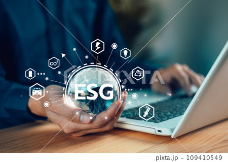 ESG, Environment Social Governance. Businessman with laptop (notebook) and Sustainable and ethical. Business organizational development. Technology of renewable resource to reduce pollution. ESG, Environment Social Governance. Businessman with laptop (notebook) and Sustainable and ethical. Business organizational development. Technology of renewable resource to reduce pollution. 109410549