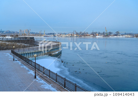View of Irkutsk waterfront with Angara river in the morning. The Angara River is a river in Eastern Siberia and the only river flowing from lake Baikal. View of Irkutsk waterfront with Angara river in the morning. The Angara River is a river in Eastern Siberia and the only river flowing from lake Baikal. 109414043