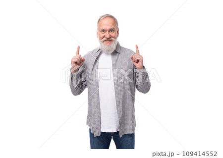 well-groomed gray-haired senior man with a beard and mustache feels healthy 109414552