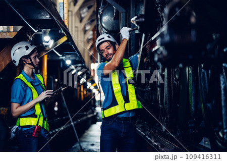 Workers Factory or Engineering work at factory site check up machine  109416311