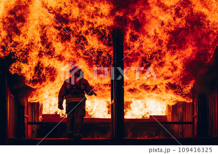 Firefighter Concept. Fireman using water and extinguisher to fighting with fire flame. 109416325