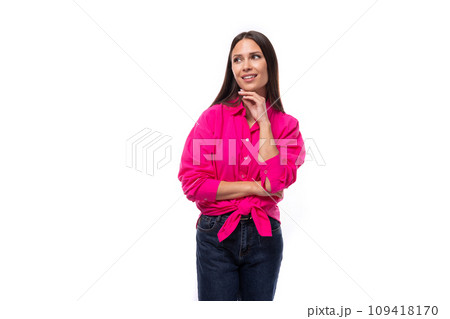 charming young brunette businesswoman dressed in a pink shirt tied it at the waist 109418170