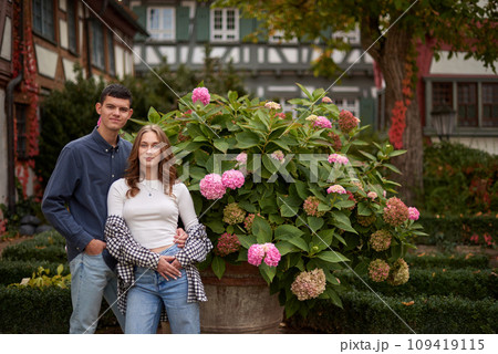 Young Cute Female Hugs Boyfriend. In Autumn Outdoor. Lovers Walking in Park. Attractive Funny Couple. Lovestory in Forest. Man and Woman. Cute Lovers in the Park. Family Concept. Happy Couple. 109419115