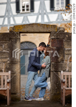 Young Cute Female Hugs Boyfriend. In Autumn Outdoor. Lovers Walking in Park. Attractive Funny Couple. Lovestory in Forest. Man and Woman. Cute Lovers in the Park. Family Concept. Happy Couple. 109419229