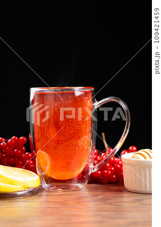 Vitamin berry viburnum tea with honey and lemon Vitamin berry viburnum tea with honey and lemon 109421459