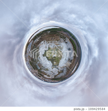 Stone quarry in the forest. Flying over the autumn mixed forest during sunset. The surroundings of Yekaterinburg. Ural, Russia, Aerial View. Little planet sphere mode Stone quarry in the forest. Flying over the autumn mixed forest during sunset. The surroundings of Yekaterinburg. Ural, Russia, Aerial View. Little planet sphere mode 109429584