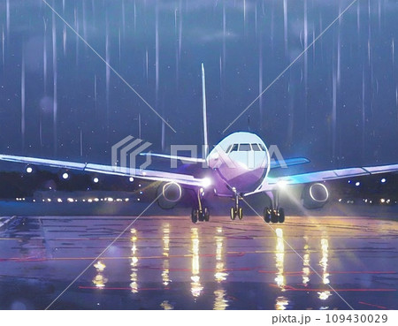 夜の滑走路に進入する航空機 109430029