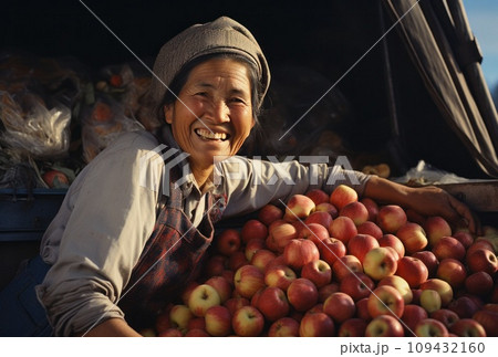 an older woman in the middle of a tray full of apples, 109432160