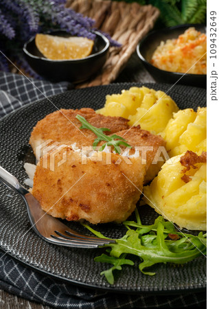 Fried cod fillet served. 109432649