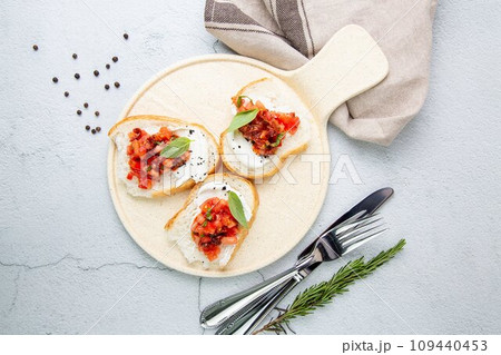 bruschetta with tomatoes and labneh cheese side view bruschetta with tomatoes and labneh cheese side view 109440453