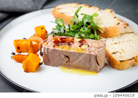 arugula with crusty bread and pate sauce, side view arugula with crusty bread and pate sauce, side view 109440619