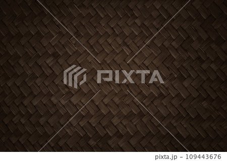 Pattern of dark brown weave reed mat with vintage style for background and design art work. 109443676