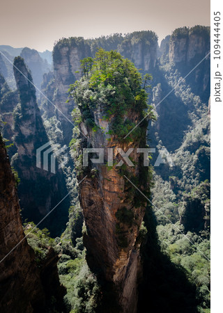 Awesome view of natural quartz sandstone pillars of the Tianzi Mountains (Avatar Mountains) in the Zhangjiajie National Forest Park ( Wulingyuan), Hunan Province, China. Fabulous landscape.this Awesome view of natural quartz sandstone pillars of the Tianzi Mountains (Avatar Mountains) in the Zhangjiajie National Forest Park ( Wulingyuan), Hunan Province, China. Fabulous landscape.this 109444405