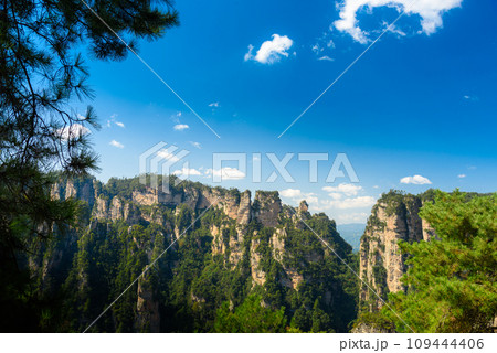 Awesome view of natural quartz sandstone pillars of the Tianzi Mountains (Avatar Mountains) in the Zhangjiajie National Forest Park ( Wulingyuan), Hunan Province, China. Fabulous landscape.this Awesome view of natural quartz sandstone pillars of the Tianzi Mountains (Avatar Mountains) in the Zhangjiajie National Forest Park ( Wulingyuan), Hunan Province, China. Fabulous landscape.this 109444406