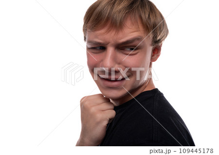 Satisfied blonde teenager is happy on white background 109445178