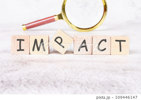IMPACT a word written on wooden cubes IMPACT a word written on wooden cubes 109446147