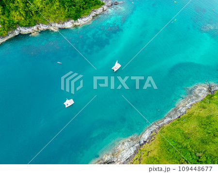Aerial view seashore with mountains at Phuket Thailand, Beautiful seacoast view at open sea in summer season,Nature recovered Environment and Travel background Aerial view seashore with mountains at Phuket Thailand, Beautiful seacoast view at open sea in summer season,Nature recovered Environment and Travel background 109448677