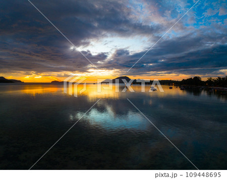 Amazing sunset or sunrise sky over sea landscape,Beautiful colorful light of nature seascape background,Drone aerial view ocean background Amazing sunset or sunrise sky over sea landscape,Beautiful colorful light of nature seascape background,Drone aerial view ocean background 109448695