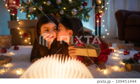 sisters love each other on Christmas 109451444