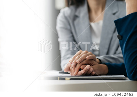 Legal advisers encourage clients. Justice and lawyer concept in the office. 109452462