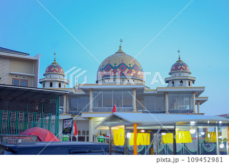 The Beauty of Islamic Mosques in Indonesia Against the Background of Blue Sky 109452981