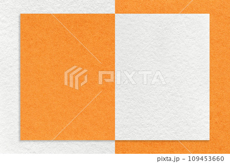 Texture of white and orange paper background with geometric shape and pattern, macro. Craft cardboard Texture of white and orange paper background with geometric shape and pattern, macro. Craft cardboard 109453660