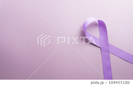 Purple ribbon on pastel paper background for supporting World Cancer Day campaign on February 4. Purple ribbon on pastel paper background for supporting World Cancer Day campaign on February 4. 109455180