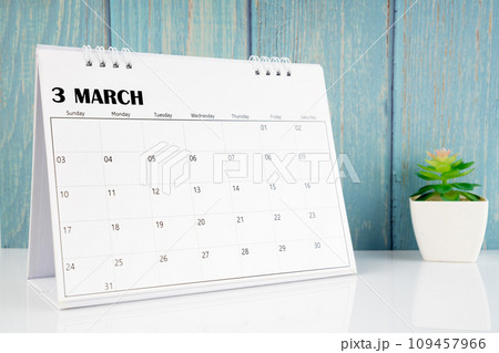 March 2024 calendar on the white table with blue wooden. 109457966