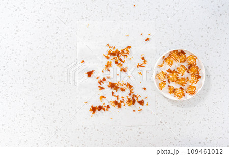 Flat lay. Crunchy caramel cupcake toppers on the counter. 109461012
