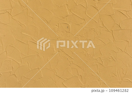 Yellow bright light vibrant paint abstract pattern plaster surface stucco wall texture background 109461282