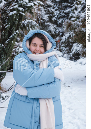 portrait of the woman get frozen outdoors at cold winter day 109463601