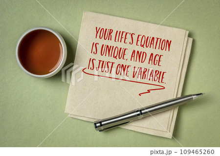 Your life's equation is unique, and age is just one variable - inspirational note on a napkin, healthy aging and personal development concept 109465260