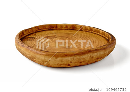 Hand-carved uneven wooden plate isolated on white background. Rustic kitchen utensils Hand-carved uneven wooden plate isolated on white background. Rustic kitchen utensils 109465732