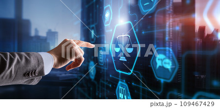 Justice and law concept. Icon Law on virtual screen. Blurred background Justice and law concept. Icon Law on virtual screen. Blurred background 109467429