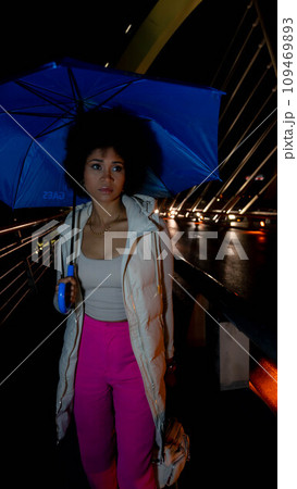 Woman with umbrella Woman with umbrella 109469893
