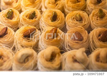 Yellow and golden sweet and delicious Turkish pastry Yellow and golden sweet and delicious Turkish pastry 109471007