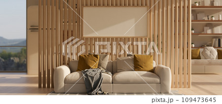 A spacious beautiful Scandinavian living room with a comfortable couch and a wood partition wall. 109473645