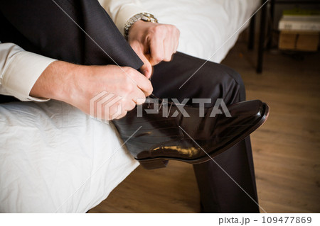 Preparation and Poise: Groom's Final Touches Preparation and Poise: Groom's Final Touches 109477869