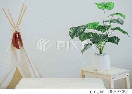 camping table with camp and tropical tree and white background 109478096
