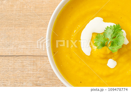 pumpkin soup in white bowl 109478774