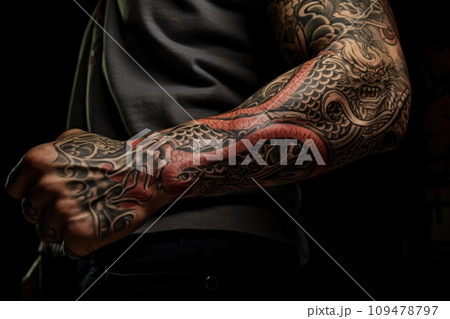 Japanese snake tattoo on his arm | Joel Gordon Photography