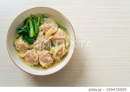 pork wonton soup or pork dumplings soup with vegetable pork wonton soup or pork dumplings soup with vegetable 109478805