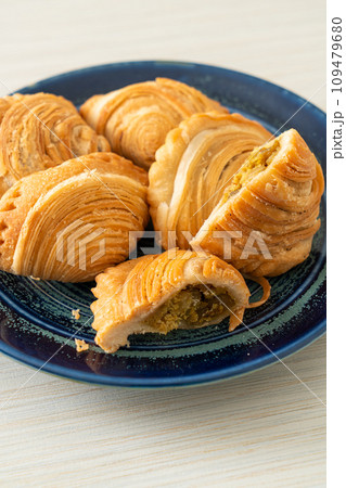 curry puff stuffed chicken on plate curry puff stuffed chicken on plate 109479680