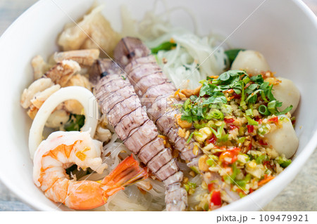 spicy seafood noodles bowl in Thai style 109479921