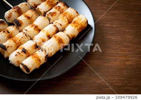 grilled tube shaped fish paste cake skewe or tube squid skewer grilled tube shaped fish paste cake skewe or tube squid skewer 109479926
