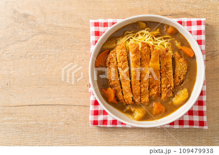 curry ramen noodles with tonkatsu fried pork cutlet curry ramen noodles with tonkatsu fried pork cutlet 109479938