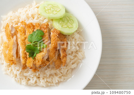 Steamed Rice with Fried Chicken or Hainanese Chicken Rice 109480750